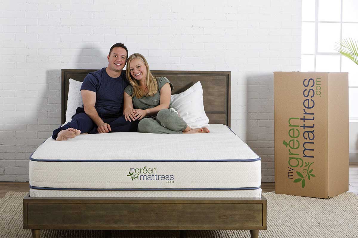 couple sitting on the Best Latex Mattress For Sex